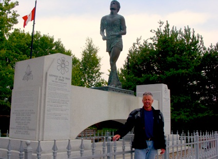 Man in front of terry Fox memorial